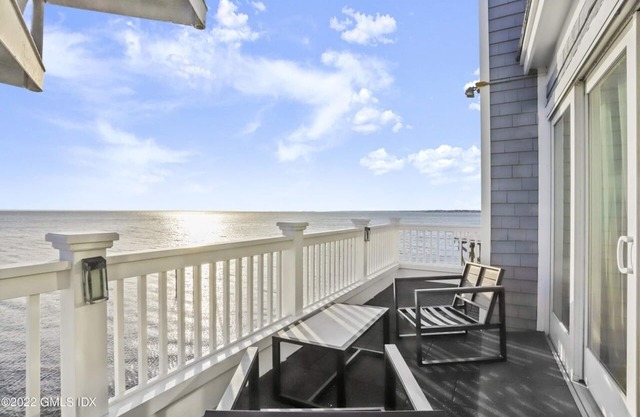 Spectacular direct waterfront with rooftop hot tub 360 degree views.