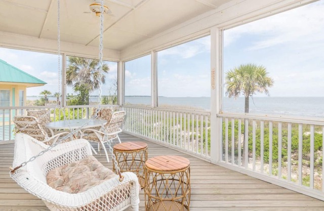 Spectacular Harbor Island home, with expansive screened-in porch, impressive ocean views, and privat