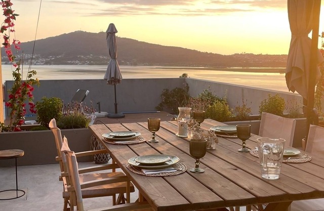 Spectacular view of the river, the sea and Spain. Magnificent layer of sun !