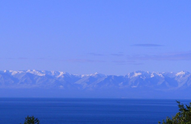 Spectacular West side views of Strait, Olympics, Victoria, south to Mt Rainier.n