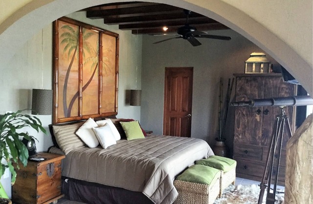 Spend the day at the Soggy Peso Palapa Bar, and spend the night in The Penthouse