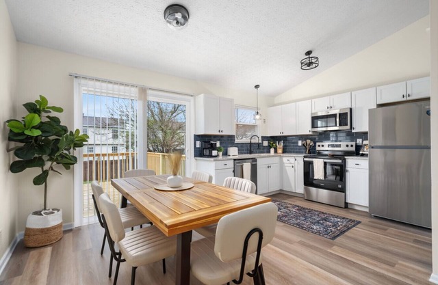 Split-Level Comfort | 2 Living Rooms, Garage, Deck