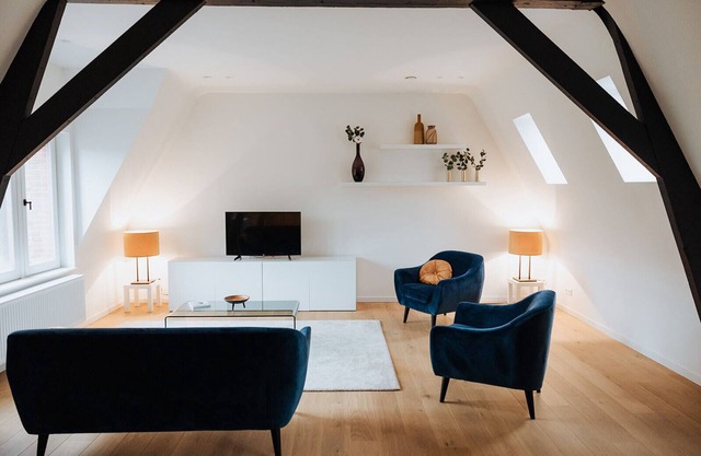 Stay in a luxury renovated carriage house on a castle domain near Bruges