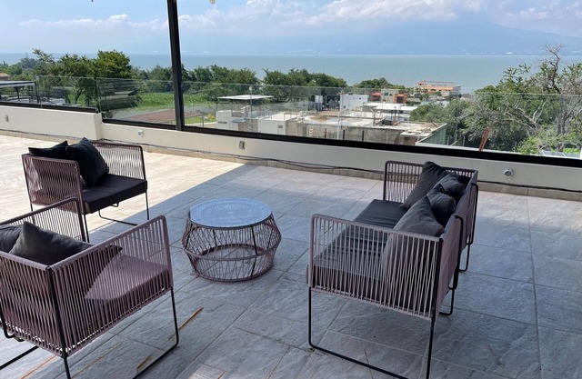 Step into serenity in our secure vacation home on Lake Chapala's shores,