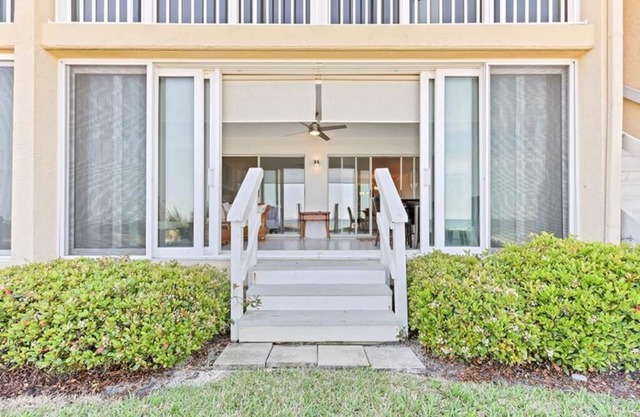 Step right on to the beach from this 2BR/2BA ground floor condo located in Retreat V