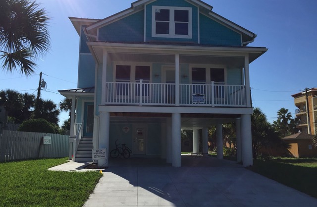 Steps to the non-driving section of the beach!