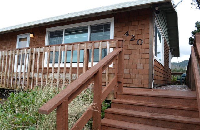 Steps to the beach from this cozy, updated home w/an oceanview, WiFi, fireplace
