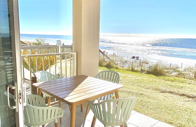 STEPS TO THE BEACH! 1st floor end unit with amazing views!
