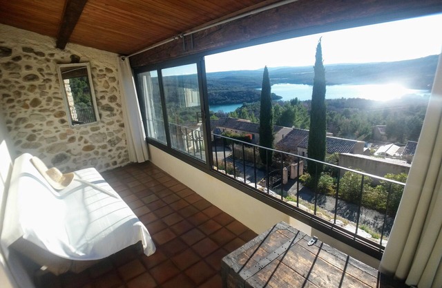 Stone house with terrace and garden facing the Lake