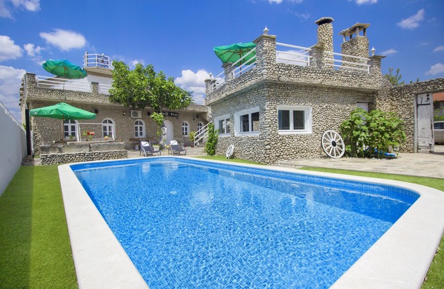Stone Ship made of thousands tiny rocks (heated pool)