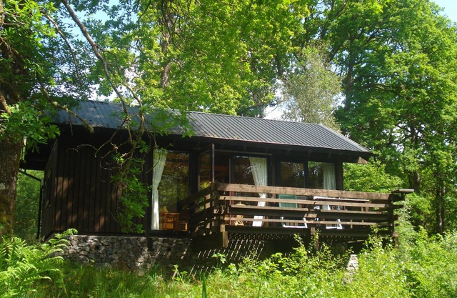 Strae is a Charming Log Cabin, Deep in the Forest, by a Babbling Burn.