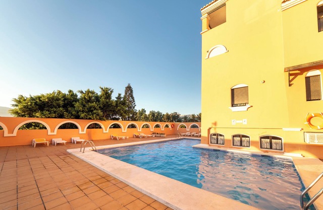 Studio Apartment 'Estudio En La Playa' with Mountain View, Shared Pool and Wi-Fi