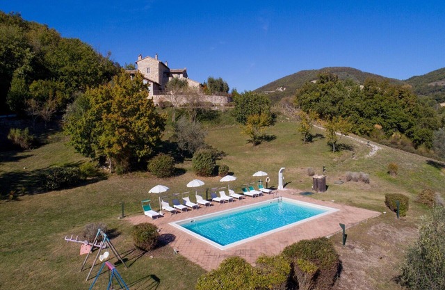 Studio apartment in a farmhouse with swimming pool