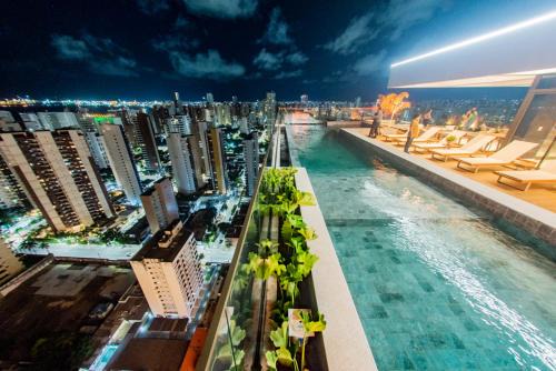 Studio Beira-mar, rooftop com piscina e jacuzzi