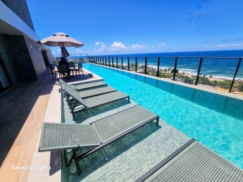 Studio Rooftop em frente ao Mar na Praia de itapua Pe na Areia