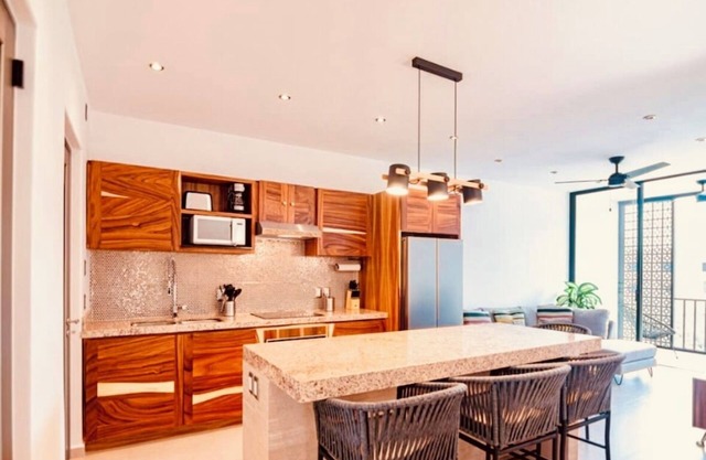 Stunning 2-bedroom condo with rooftop pool & walking distance beach in Huatulco.