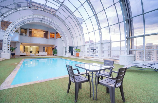 Stunning 9-BR PH with Spa, Concierge, Breakfast & WiFi in Medellín