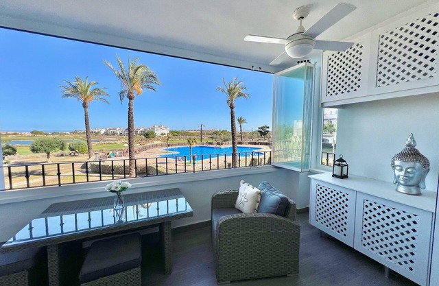 Stunning apartment with a pool and golf view