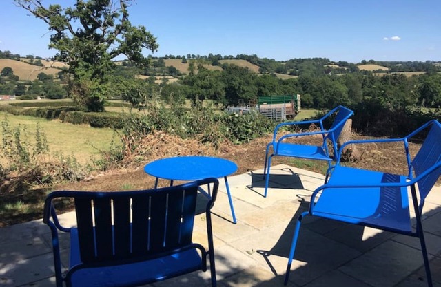 Stunning home with stunning lake and valley views and rolling hills.