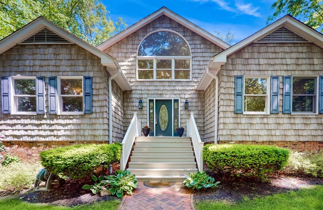 Stunning lakefront retreat w/firepit, game room, & water views