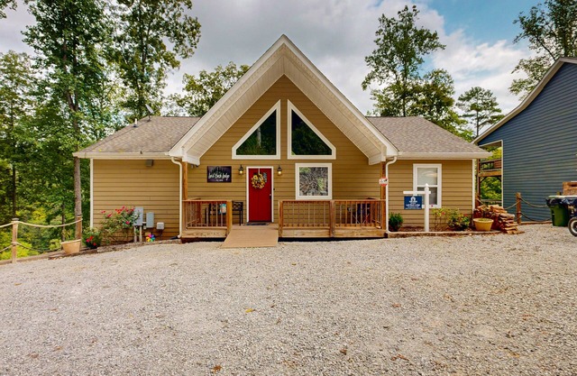 Stunning Lakeview Home with game room, fire pit, dock, & hot tub