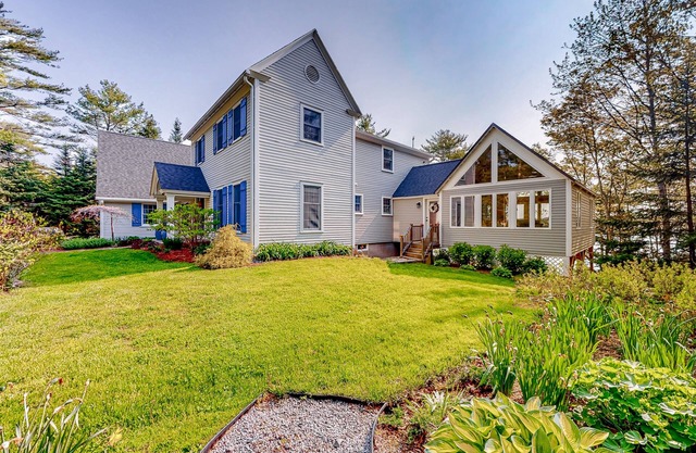 Stunning riverfront gem with private dock, gourmet kitchen, and firepit