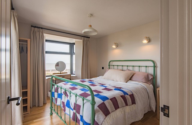 Stylish and spacious coastal retreat with sea views