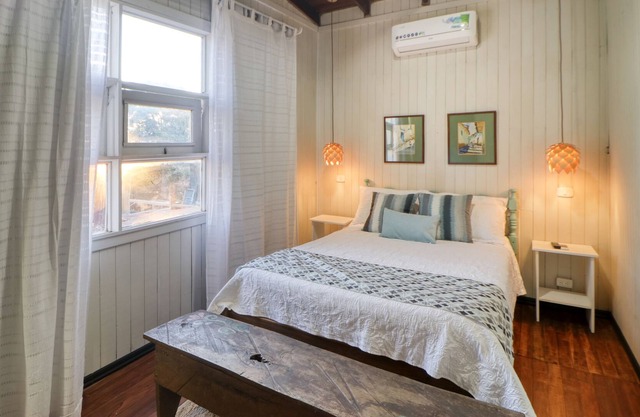 Stylish hotel suite in family hotel with bay views, fast WiFi, & restaurant