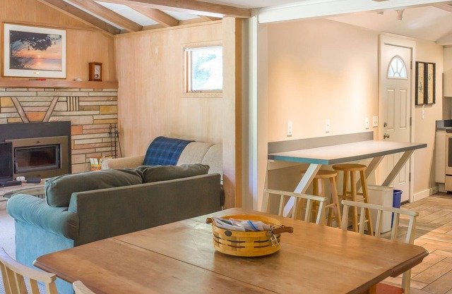 Sun-lit cottages with private lake access, basketball court, kayaks, and firepit