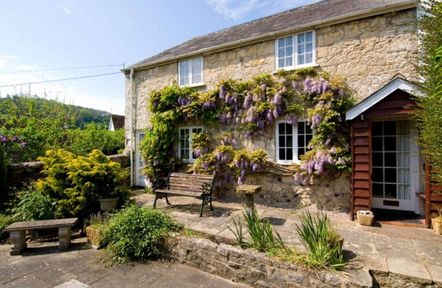 Sunbeam Cottage nestling in the heart of Branscombe village with a parking space