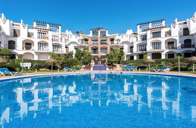 Sunny balcony with pool by Costarentals - Ref M52