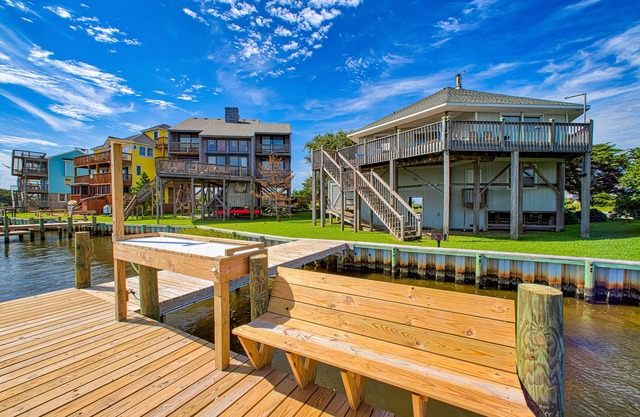 Sunny canal-front home w/deck, boat dock, private washer/dryer, & central AC