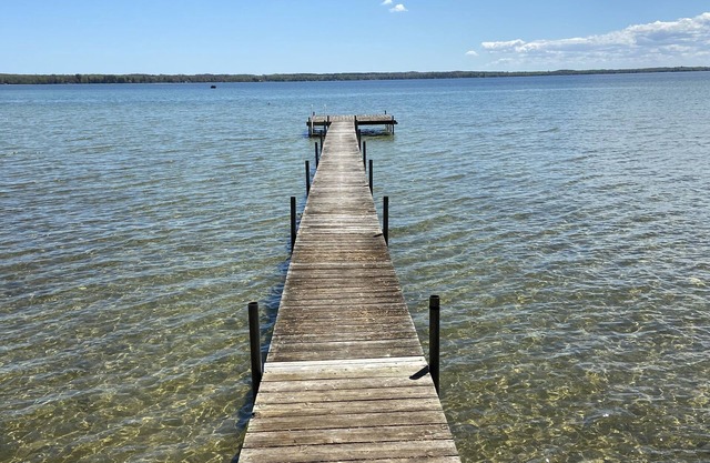 Sunrise on Mullett Lake, 115' Lakefront sandy bottom, private dock, new remodel