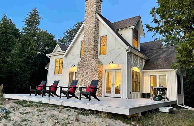 Sunsets, Sandy Beach and Seclusion; enjoy them all at this stunning lake house