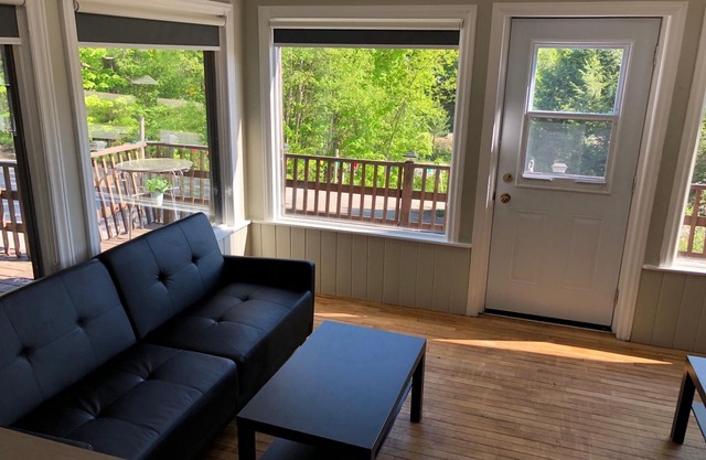 Super Spacious 2300 SF Lounge Suite with Walk Out Deck, Sunroom, Foosball, Bar