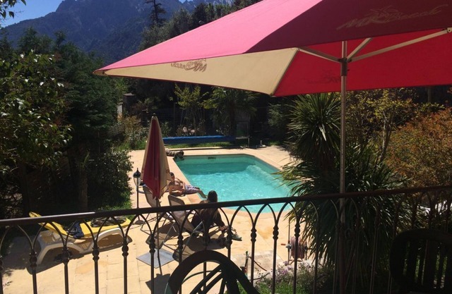 superb villa village center exceptional view. Swimming pool and wooded grounds.