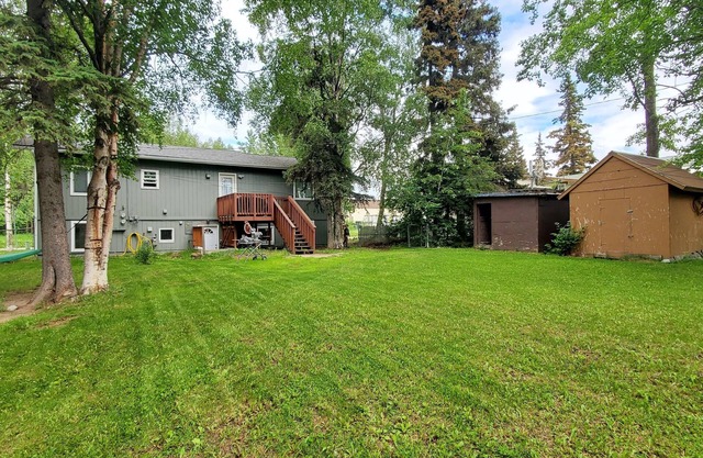 Taku Area duplex with yard and campbell creek trail