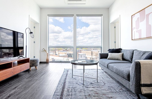 Tasteful Logan Square 2BR w/Gym, Roof Deck, 1 block to L, by Blueground