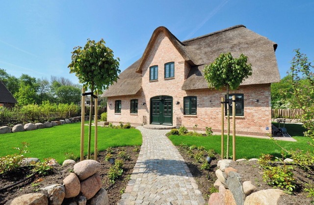 Thatched roof house "Das Waalhuus" - The place for family & friends in St. Peter-Dorf