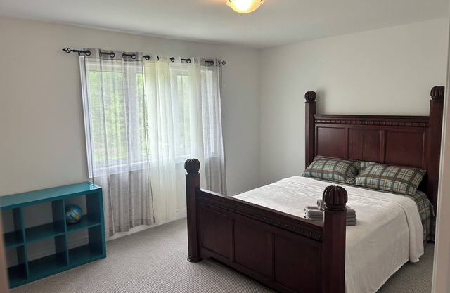 The Angus Nest: Master Suite with Jacuzzi, fireplace —perfect for a retreat.