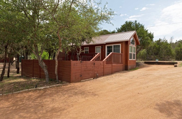 The Bison cabin in a gated 2 acre boutique tiny home resort with pool!