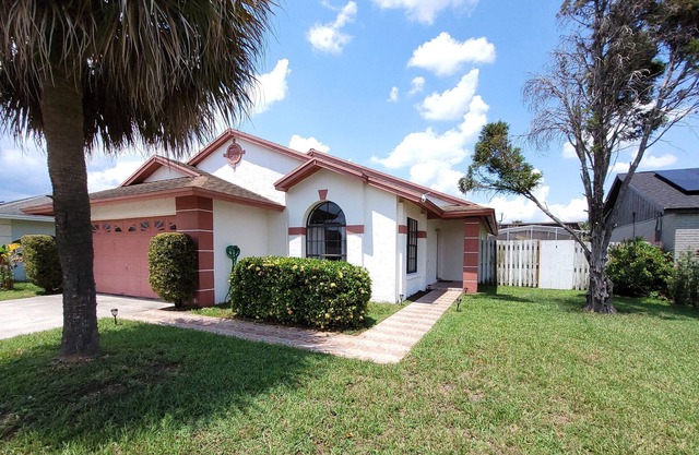 The Cozy Haven in Kissimmee, FL with heated pool just 10 minutes to theme parks!