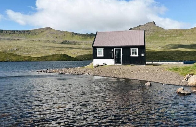 The Hidden People's Cottage by Vatnses Lake