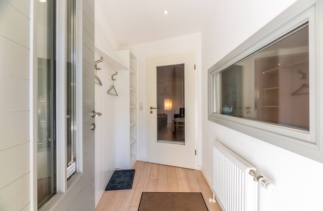 The location is heavenly quiet on the outskirts of the city, surrounded by green trees.