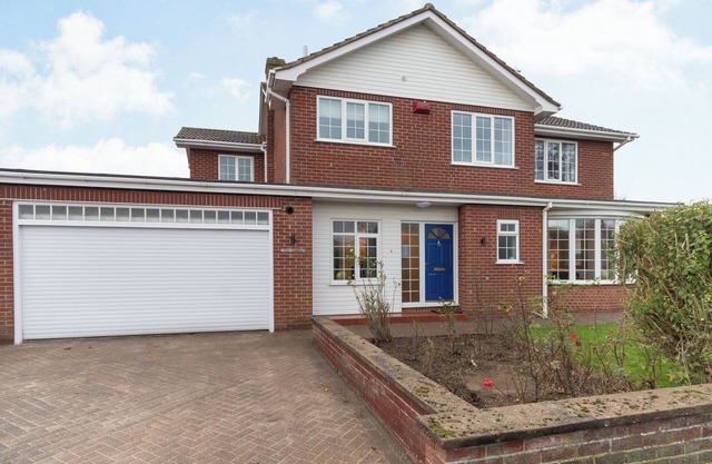 The open plan living area and interior design are a delight.