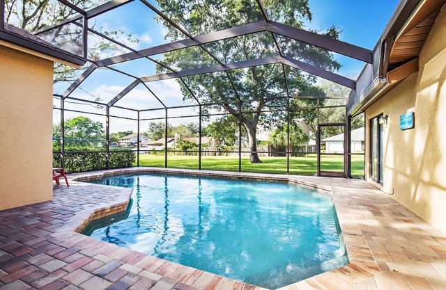 THE PINE WARBLER 4 BEDROOM 2.5 BATH POOL HOME PERFECT FOR ONE OR TWO FAMILIES