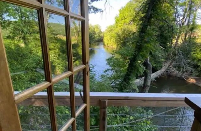 The Quack Shack is a treehouse located along the banks of The French Broad River