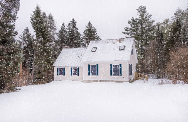 The Whimsical Chalet is a lovely cape on acres. Private setting less than 10 minutes to skiing.