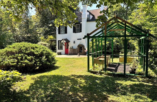 This 4 BR 4 BA sizable home with large outdoor porch & yard is ideal for a family visiting the area.