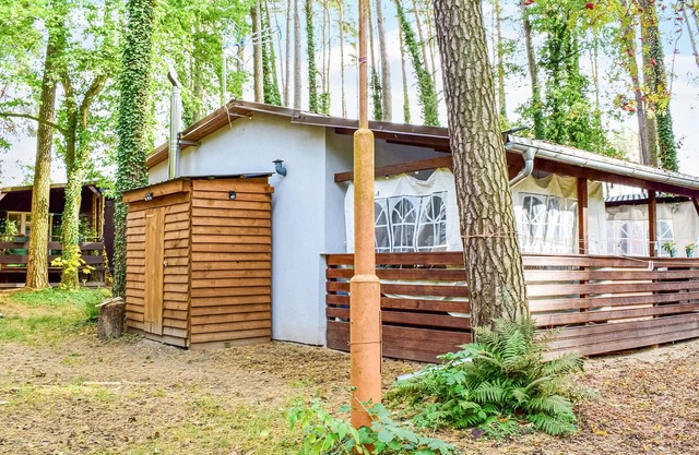 This beautiful cottage is located in the village G??bokie in the resort Archimedes.